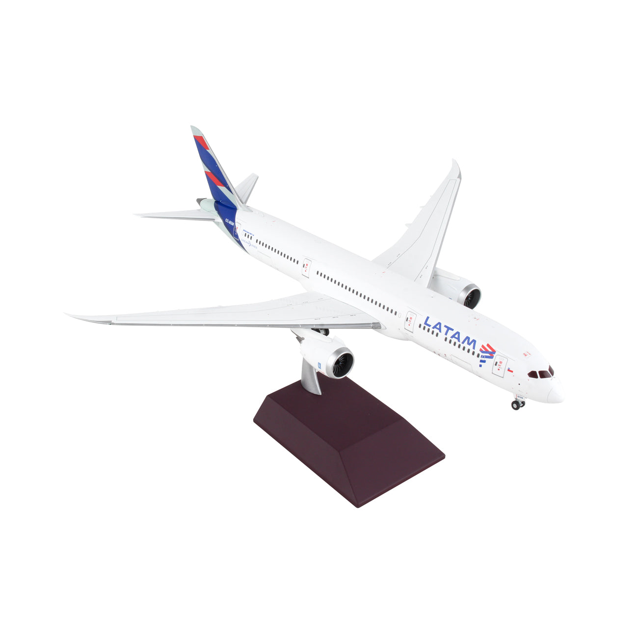 The Daron LATAM Airlines Boeing 787-9 1:200 die-cast metal model is displayed on a black stand against a white background.