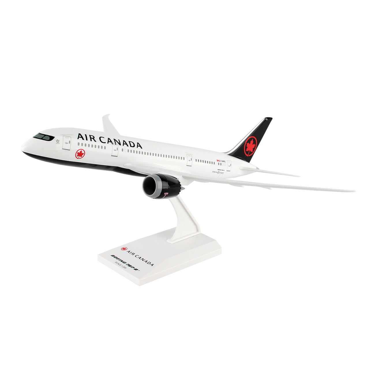 The Daron Air Canada Boeing 787-8 2017 1:200 model features a white fuselage, black tail and engines, and displays the iconic red Air Canada logo on the tail and beside the airline name. It comes mounted on a white stand with detailed graphics.