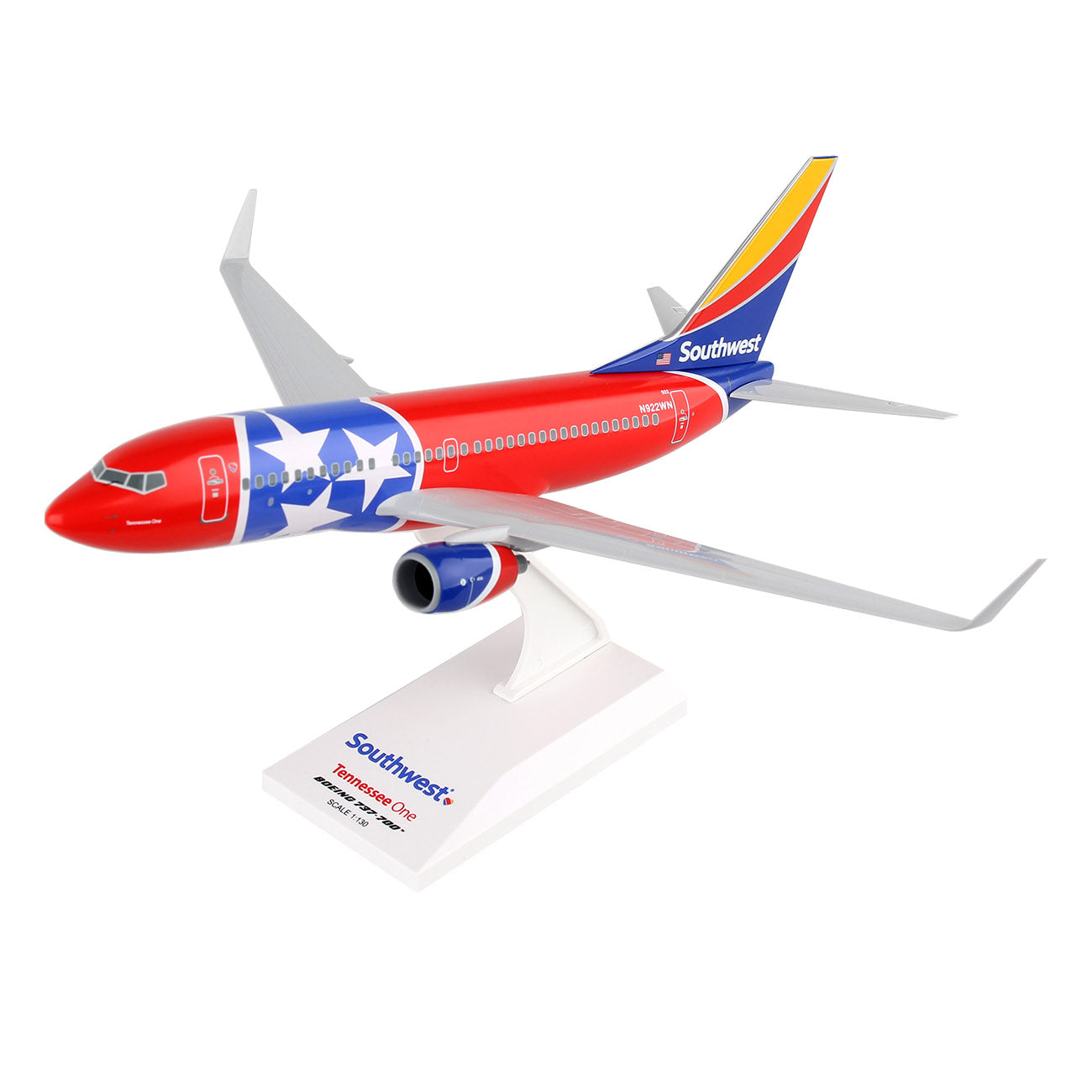 The Daron collectors model, titled Southwest Airlines Boeing 737-700 Tennessee One 1:130, features a red, blue and white design with a star on the fuselage and Southwest on the tail fin. It comes with a stand labeled Southwest Airlines.