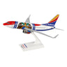 Collectors will adore Darons Southwest Airlines Boeing 737-700 Missouri One 1:130 Model, showcasing a colorful design with vibrant red, blue, and white hues featuring a bear and star motif. It comes mounted on a stand proudly displaying the Southwest logo.