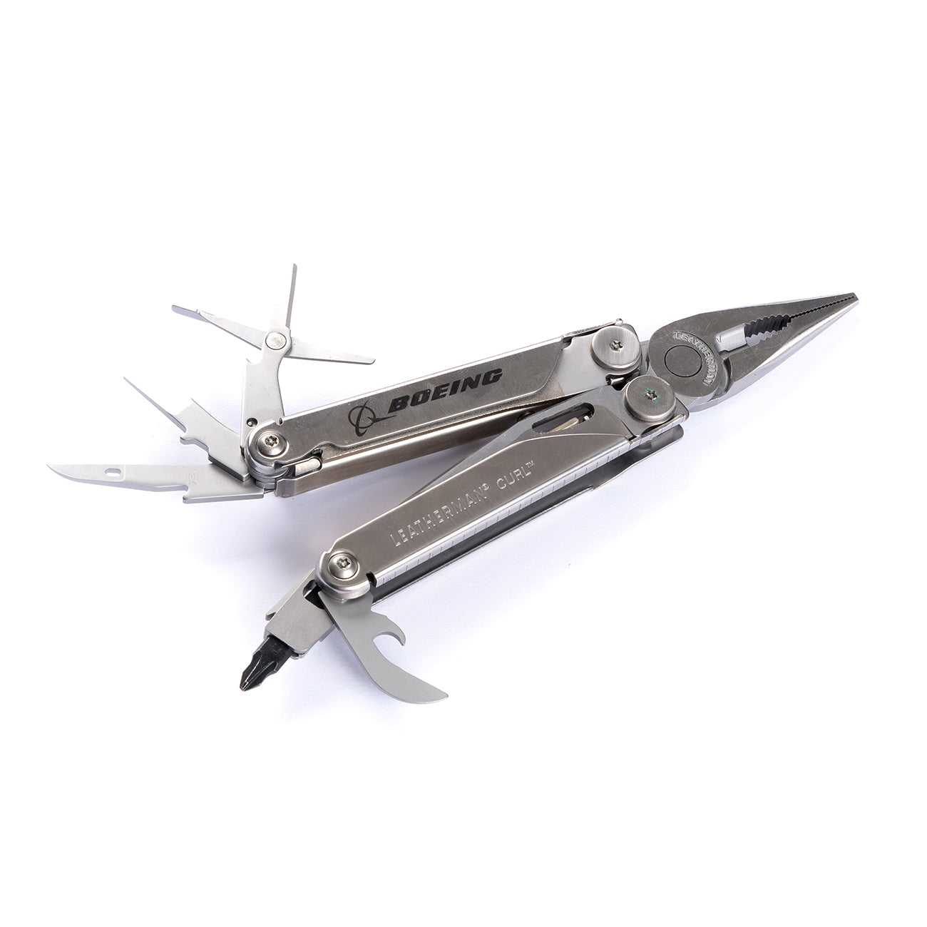 The Boeing Stores silver Boeing Leatherman Curl multitool features extended tools, including pliers, screwdrivers, and a bottle opener. It comes with a convenient pocket clip and displays Boeing branding against a white background.