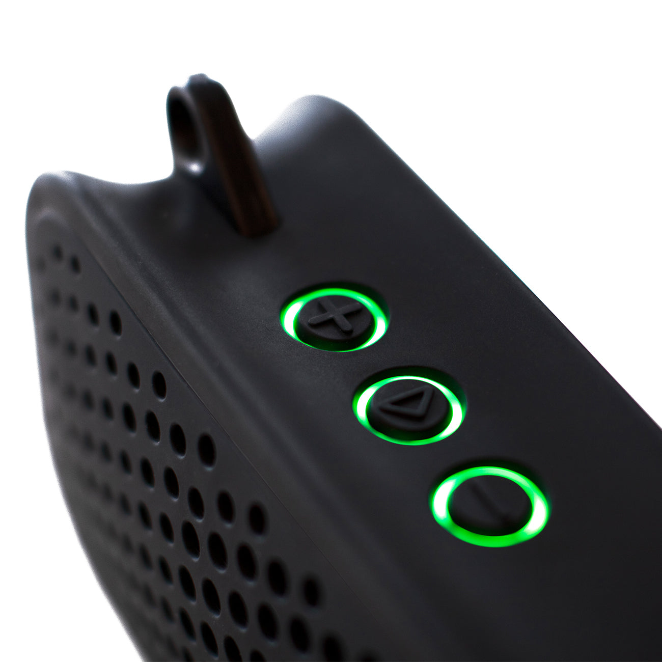 Close-up of The Boeing Stores Boompods Blockblaster Speaker, featuring three circular buttons (plus, minus, power) with green LED outlines and a perforated surface pattern that enhances the Hi-Fi wireless speakers sleek design.