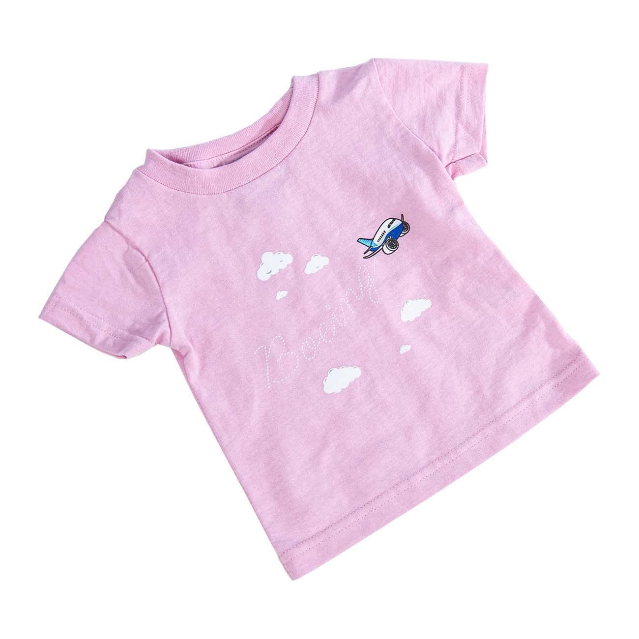 The Boeing Stores Baby Pudgy Trail T-shirt is a pink toddler tee made of 100% cotton jersey. It features a small airplane and cloud design with Bonito in white script on the front, similar to the Boeing Toddler T-Shirt line, against a plain white background.