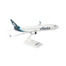 The Daron Alaska Airlines Boeing 737-900ER 1:130 Model features detailed “Alaska” graphics and a native Alaskan face logo on the tail, making it an ideal collectible for aviation fans and model enthusiasts.
