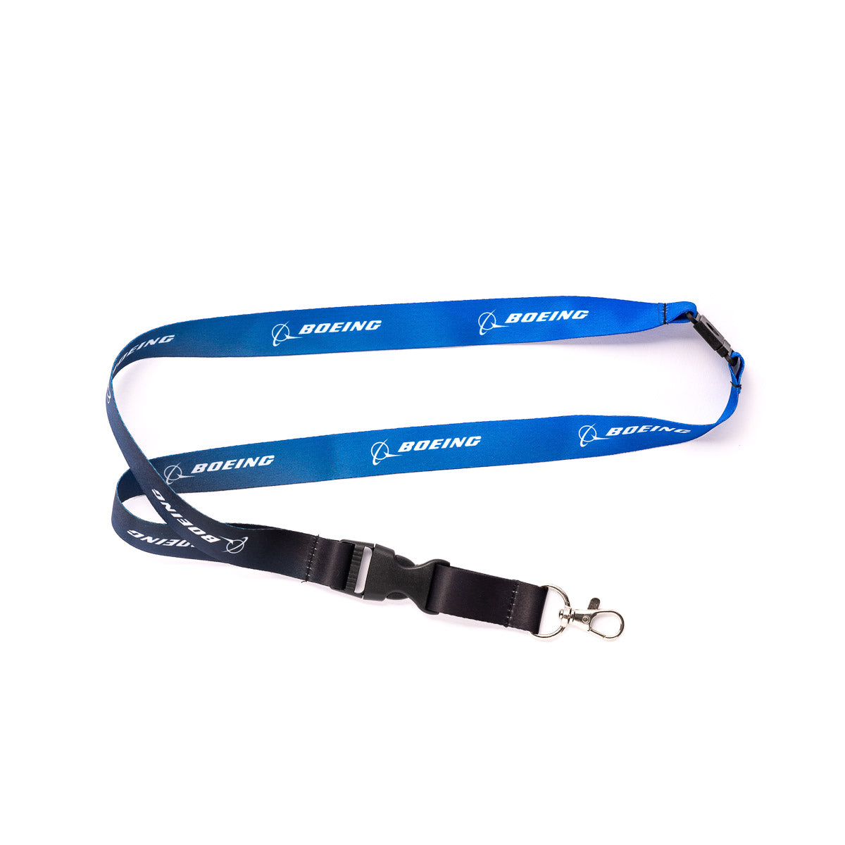 The Boeing Stores Boeing Ombre Lanyard is blue and black with the Boeing logo in white, featuring a metal clip, breakaway clasp, and a detachable buckle for convenience.
