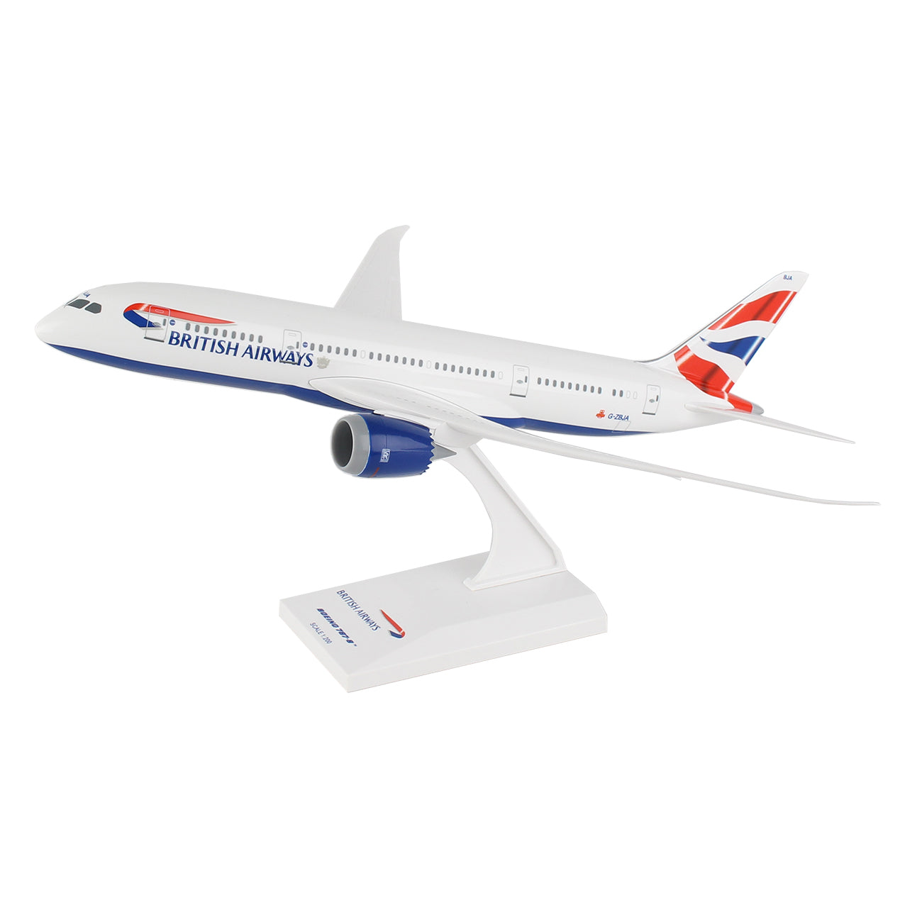The Daron British Airways Boeing 787-8 1:200 Model features authentic markings, a white fuselage with blue accents, a red and blue tail design, visible underwing jet engines, and comes with a branded stand.