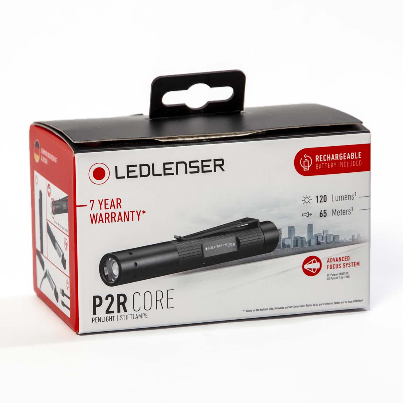 A box of Boeing Ledlenser P2R Core Flashlight from The Boeing Store, with 120 lumens, 65m range, advanced focus system, rechargeable battery, and 7-year warranty. The box features an image of the rechargeable flashlight.