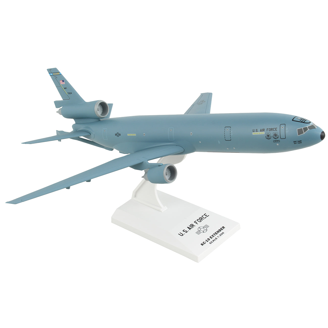 A collectors dream, the Daron Boeing KC-10 USAF McGuire AFB 1:200 model boasts a sleek blue design with two wing engines and one tail engine. It’s displayed on a white stand, featuring the aircraft name and serial number.
