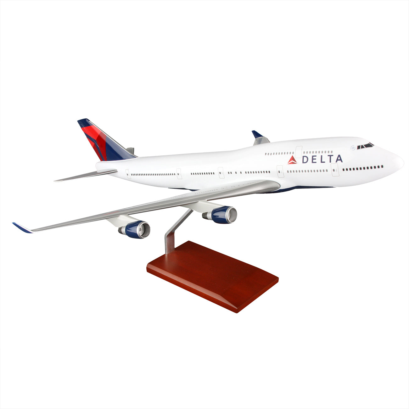 The Daron Delta Air Lines Boeing 747-400 1:100 model features a white body with blue and red accents, the Delta logo, four engines, and comes mounted on a wooden stand—perfect for collectors.