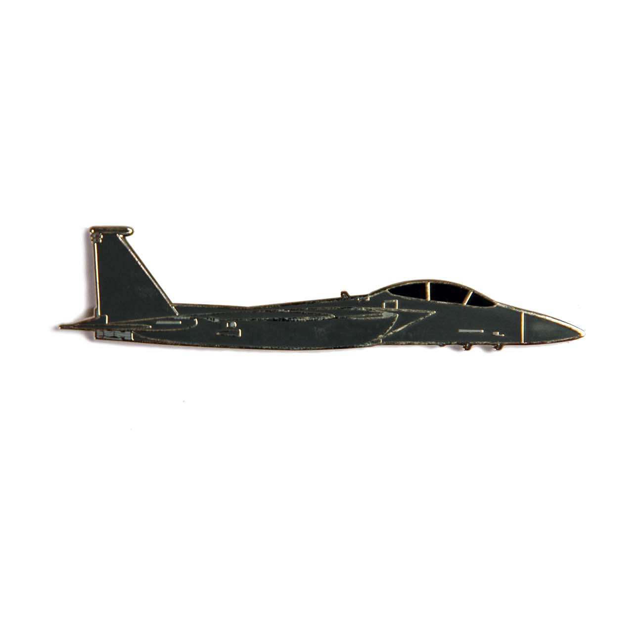 A Boeing F-15 Illustrated Magnet by The Boeing Store is displayed on a simple white backdrop. The magnets enamel color fill highlights the jets wings, cockpit, and tail with intricate details.